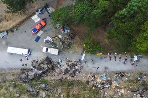 EDITORS NOTE: Graphic content / Aerial view of the aftermath after a bus transporting migrant people crashed in Gualaca, Panama on February 15, 2023. - At least 39 people, most of them undocumented US-bound migrants who had just survived a perilous jungle crossing, died in a bus crash in Panama early Wednesday, officials said. (Photo by Mauricio VALENZUELA / AFP)