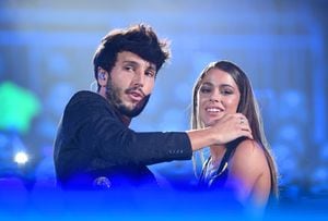 CORAL GABLES, FLORIDA - JULY 18: (L-R) Sebastian Yatra and Tini perform on stage during Premios Juventud 2019 at Watsco Center on July 18, 2019 in Coral Gables, Florida. (Photo by Jason Koerner/Getty Images)