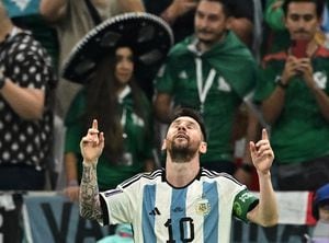 Soccer Football - FIFA World Cup Qatar 2022 - Group C - Argentina v Mexico - Lusail Stadium, Lusail, Qatar - November 26, 2022 Argentina's Lionel Messi celebrates scoring their first goal REUTERS/Dylan Martinez