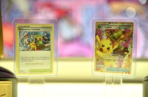 LONDON, ENGLAND - AUGUST 18: The Pikachu Pokemon winners cards are displayed during the 2022 Pokémon World Championships at ExCel on August 18, 2022 in London, England. For the first time in history, the championship event is being held outside of North America, London Excel will host the competition on August 18–21. Some of the best Pokémon players from around the will compete in Pokémon TCG, the Pokémon Sword and Pokémon Shield video games, Pokémon GO, Pokémon UNITE, and Pokkén Tournament DX. Half a million dollars in prizes, the title of Pokémon World Champion, and return invitations for the following year's Worlds are up for grabs. (Photo by John Keeble/Getty Images)