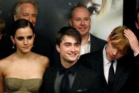 FILE PHOTO: Cast members Rupert Grint (R), Daniel Radcliffe and Emma Watson (L) arrive for the premiere of the film "Harry Potter and the Deathly Hallows: Part 2" in New York July 11, 2011.  REUTERS/Lucas Jackson/File Photo