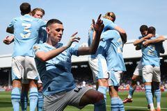 Manchester City's English midfielder #47 Phil Foden celebrates scoring the team's second goal during the English Premier League football match between Fulham and Manchester City at Craven Cottage in London on May 11, 2024. (Photo by Adrian DENNIS / AFP) / RESTRICTED TO EDITORIAL USE. No use with unauthorized audio, video, data, fixture lists, club/league logos or 'live' services. Online in-match use limited to 120 images. An additional 40 images may be used in extra time. No video emulation. Social media in-match use limited to 120 images. An additional 40 images may be used in extra time. No use in betting publications, games or single club/league/player publications. /