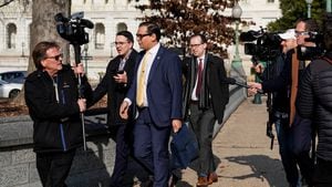Embattled freshman U.S. Representative George Santos (R-NY) is pursued by reporters as he walks to a vote on Capitol Hill in Washington, U.S., January 12, 2023. REUTERS/Elizabeth Frantz