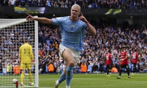 Manchester City's Erling Haaland celebrates after scoring his side's third goal during the English Premier League soccer match between Manchester City and Manchester United at Etihad stadium in Manchester, England, Sunday, Oct. 2, 2022. (Martin Rickett/PA via AP)