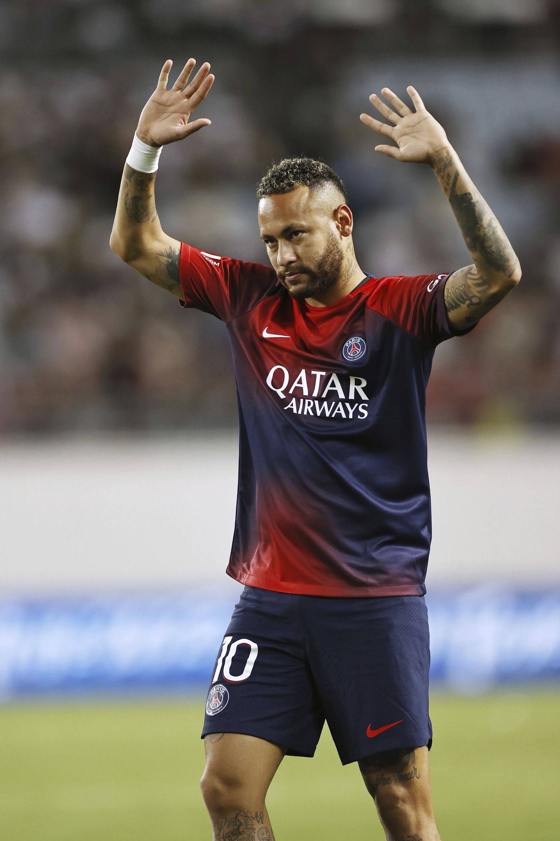 Paris Saint-Germain's Neymar acknowledges the supporters after a friendly soccer match against Al Nassr in Osaka,  western Japan, Tuesday, July 25, 2023. (Kyodo News via AP)
