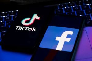 TikTok and Facebook logos displayed on phone screens and a laptop keyboard are seen in this illustration photo taken in Krakow, Poland on February 6, 2022. (Photo illustration by Jakub Porzycki/NurPhoto via Getty Images)