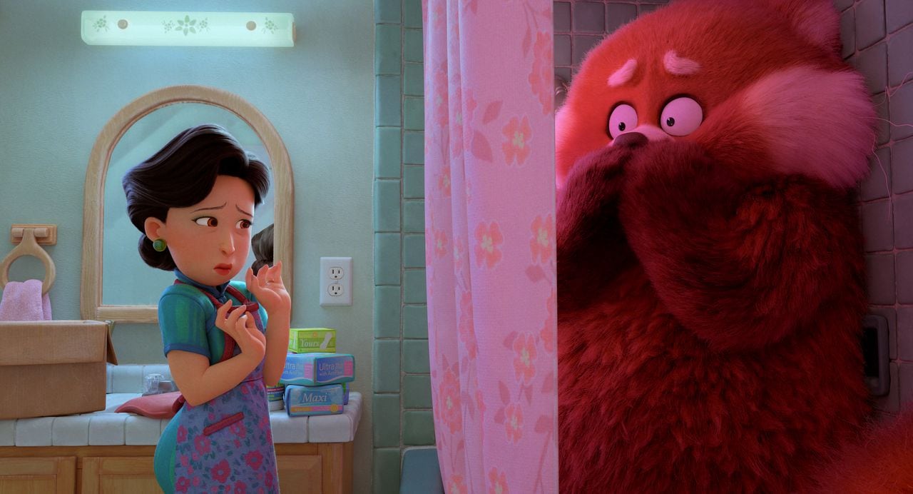 MOTHER’S NATURE – In Disney and Pixar’s all-new original feature film “Turning Red,” confident-but-dorky teenager Mei Lee is torn between staying her mother’s dutiful daughter, the chaos of adolescence, and the fact that she suddenly “poofs” into a giant red panda when she gets too excited. Mei’s determined and protective mother, Ming, vows to do whatever it takes to help her daughter. Featuring Rosalie Chiang as the voice of Mei, and Sandra Oh as the voice of Mei’s mother, Ming, “Turning Red” opens in theaters on March 11, 2022. © 2021 Disney/Pixar. All Rights Reserved.