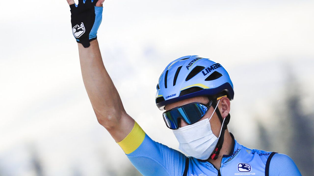 Colombia's Miguel Angel Lopez greets fans prior to the start of stage 18 of the Tour de France cycling race over 175 kilometers (108.7 miles) from Meribel to La Roche-sur-Foron, France, Thursday, Sept. 17, 2020. (Christophe Petit-Tesson/Pool via AP)
