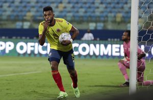 Colombia's Miguel Borja celebrates after scoring his side's opening goal from the penalty spot during a Copa America soccer match against Peru at Olimpico stadium in Goiania, Brazil, Sunday, June 20, 2021. (AP Photo/Eraldo Peres)