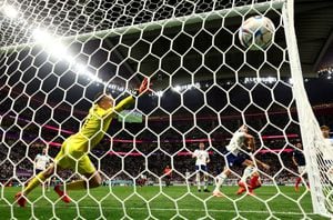 Soccer Football - FIFA World Cup Qatar 2022 - Quarter Final - England v France - Al Bayt Stadium, Al Khor, Qatar - December 10, 2022 France's Olivier Giroud scores their second goal REUTERS/Matthew Childs