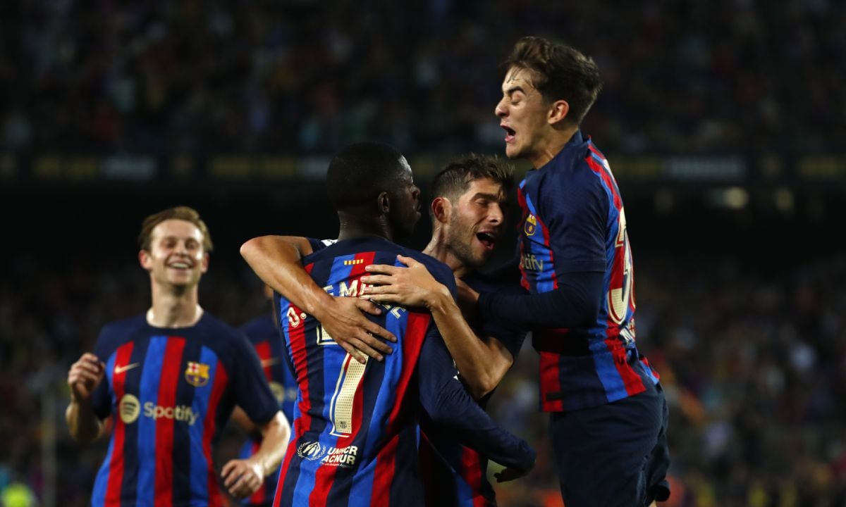 Barcelona's Ousmane Dembele, second left, celebrates with bis team-mates after scoring his side's opening goal during a Spanish La Liga soccer match between Barcelona and Athletic Club at the Camp Nou stadium in Barcelona, Spain, Sunday, Oct. 23, 2022. (AP/Joan Monfort)