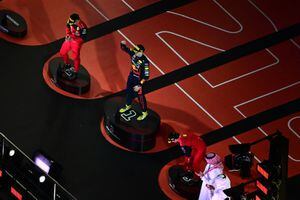 JEDDAH, SAUDI ARABIA - MARCH 27: Race winner Max Verstappen of the Netherlands and Oracle Red Bull Racing, Second placed Charles Leclerc of Monaco and Ferrari and Third placed Carlos Sainz of Spain and Ferrari on the podium during the F1 Grand Prix of Saudi Arabia at the Jeddah Corniche Circuit on March 27, 2022 in Jeddah, Saudi Arabia. (Photo by Clive Mason/Getty Images)