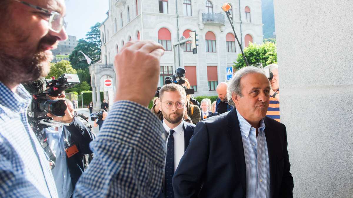 The former president of the the European Football Association (UEFA), Michel Platini, right, arrives at the Swiss Federal Criminal Court in Bellinzona, Switzerland, Wednesday, June 8, 2022. Platini and the former president of the World Football Association (Fifa), Joseph Blatter, will stand trial before the Federal Criminal Court from Wednesday, over a suspicious two-million payment. (Alessandro Crinari/Keystone via A