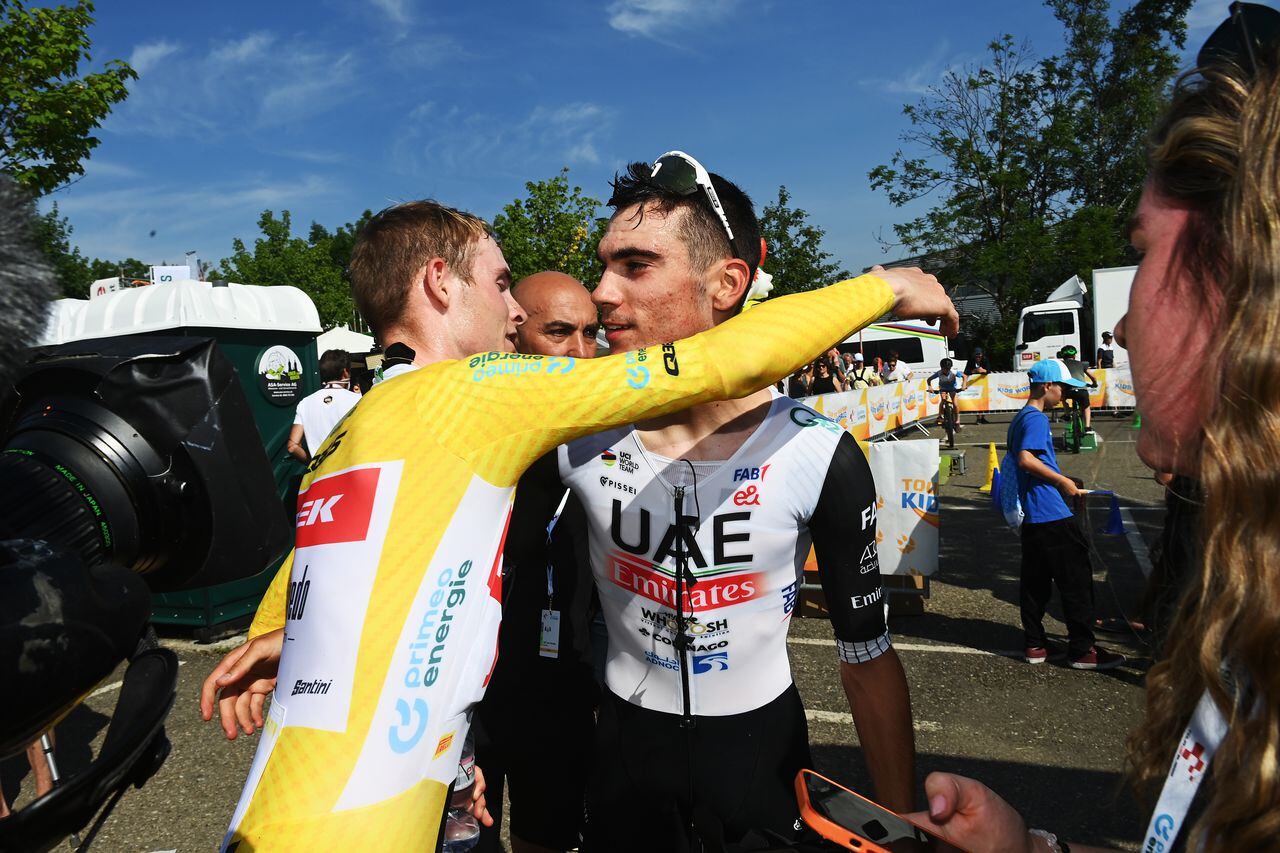 ABTWILL, SWITZERLAND - JUNE 18: (L-R) Overall race winner Mattias Skjelmose Jensen of Denmark and Team Trek-Segafredo - Yellow Leader Jersey and stage winner Juan Ayuso of Spain and UAE Team Emirates react after the 86th Tour de Suisse 2023, Stage 8 a 25.7km individual time trial from St. Gallen to Abtwil / #UCIWT / on June 18, 2023 in Abtwil, Switzerland. (Photo by Tim de Waele/Getty Images)