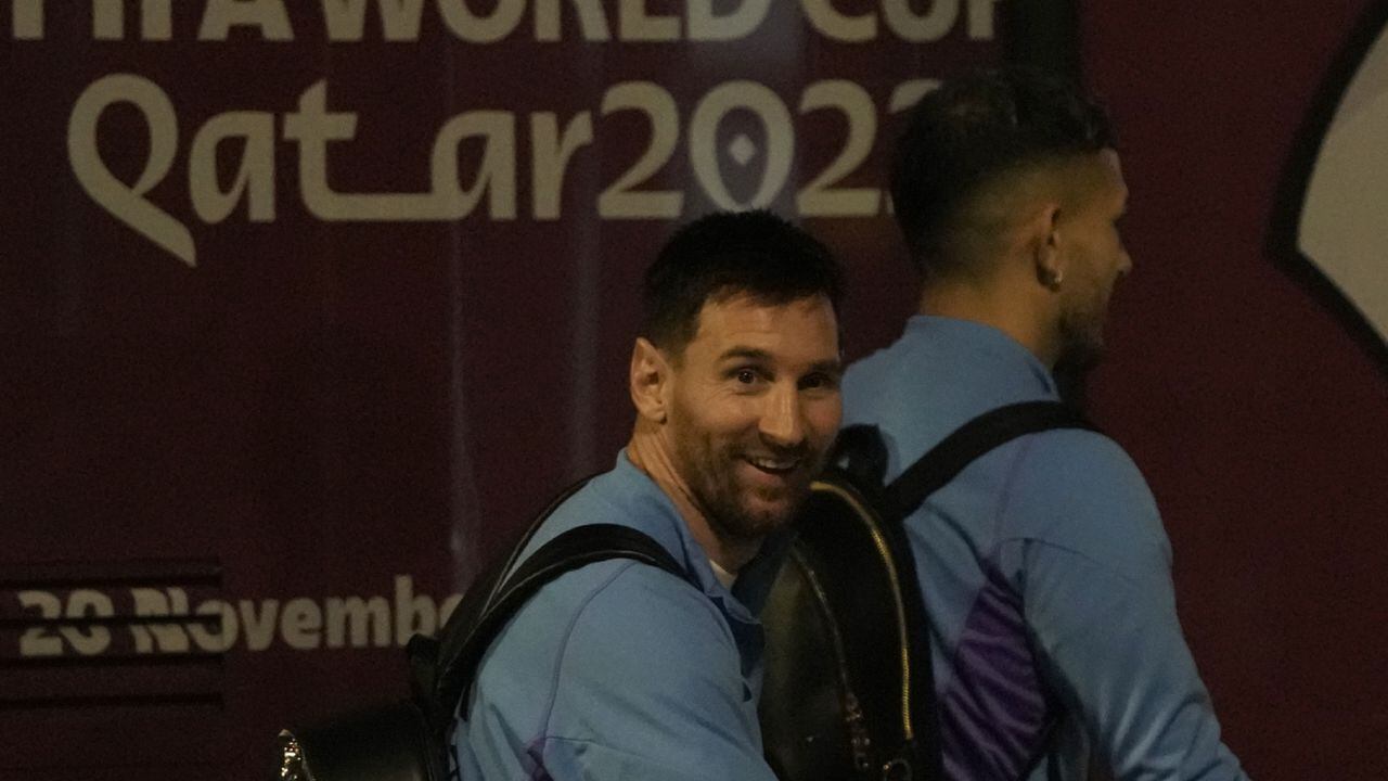 Lionel Messi of Argentina's national soccer team arrives with teammates at Hamad International airport in Doha, Qatar, Thursday, Nov. 17, 2022 ahead of the upcoming World Cup. Argentina will play the first match in the World Cup against Saudi Arabia on Nov. 22. (AP/Hassan Ammar)