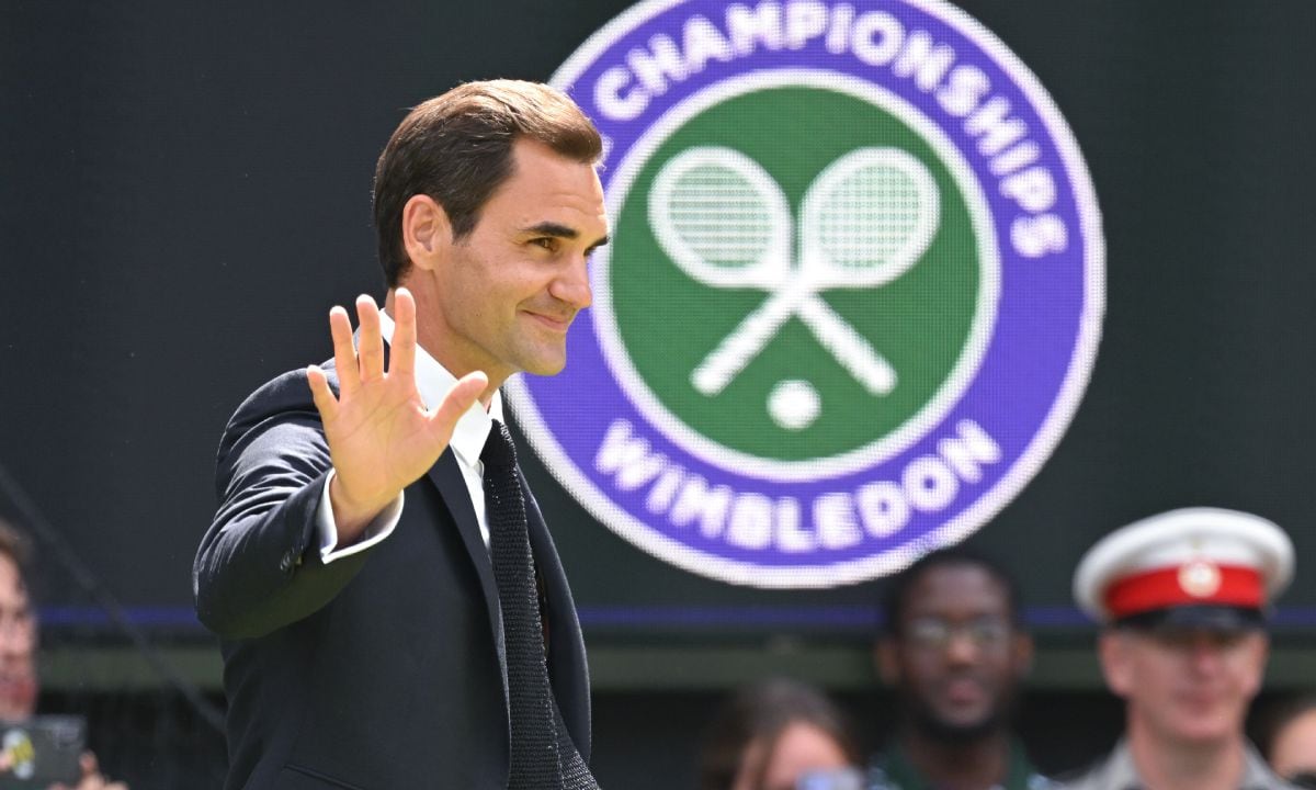 LONDON, ENGLAND - JULY 03: Roger Federer of Switzerland acknowledges spectators at the Centre Court Centenary Celebration on day seven of the Wimbledon Tennis Championships at the All England Lawn Tennis and Croquet Club on July 03, 2022 in London, England. (Photo by Getty Images/Karwai Tang/WireImage)