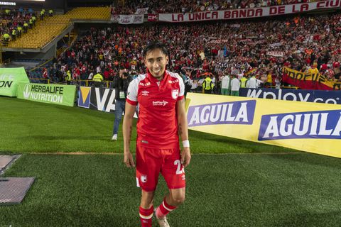 Fabian Sambueza of Independiente Santa Fe celebrates the third goal in the classic capital against Millonarios.  during a match between Millonarios and Independiente Santa Fe as part of the Liga Aguila 2019 II at Estadio El Campin on October 23, 2019 in Bogota, Colombia. (Photo by Daniel Garzon Herazo/NurPhoto via Getty Images)