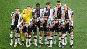 Soccer Football - FIFA World Cup Qatar 2022 - Group E - Germany v Japan - Khalifa International Stadium, Doha, Qatar - November 23, 2022
Germany players pose for a team group photo covering their mouths before the match REUTERS/Molly Darlington