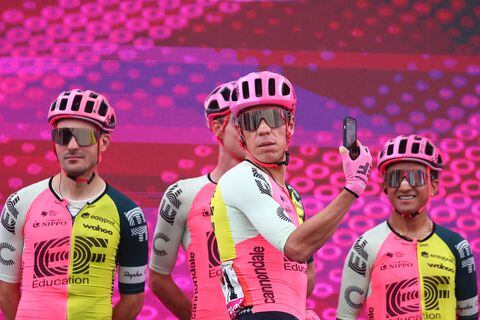 EF Education-EasyPost's Colombian rider Rigoberto Uran (C) and teammates stand on the podium during the teams' presentation, prior to the seventh stage of the Giro d'Italia 2023 cycling race, 218 km between Capua and Gran Sasso d'Italia, on May 12, 2023. (Photo by Luca Bettini / AFP)