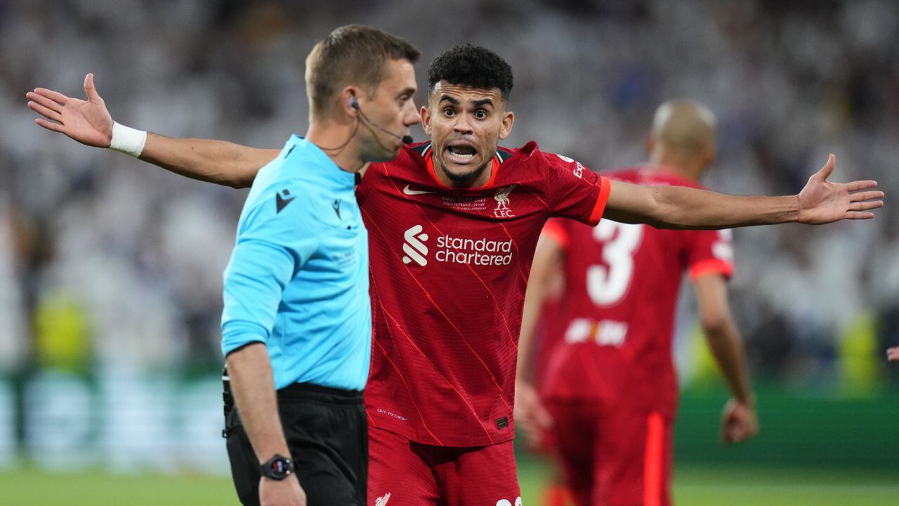 Liverpool's Luis Diaz complains to the referee during the Champions League final soccer match between Liverpool and Real Madrid at the Stade de France in Saint Denis near Paris, Saturday, May 28, 2022. (AP/Petr David Josek)