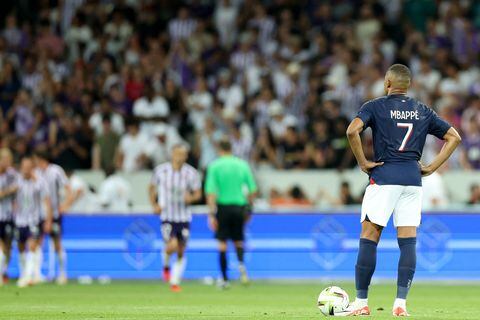 Paris Saint-Germain's French forward #07 Kylian Mbappe stands with the ball on the pitch during the French L1 football match between Toulouse FC and Paris Saint-Germain (PSG) at The TFC Stadium in Toulouse, southwestern France, on August 19, 2023. (Photo by Charly TRIBALLEAU / AFP)