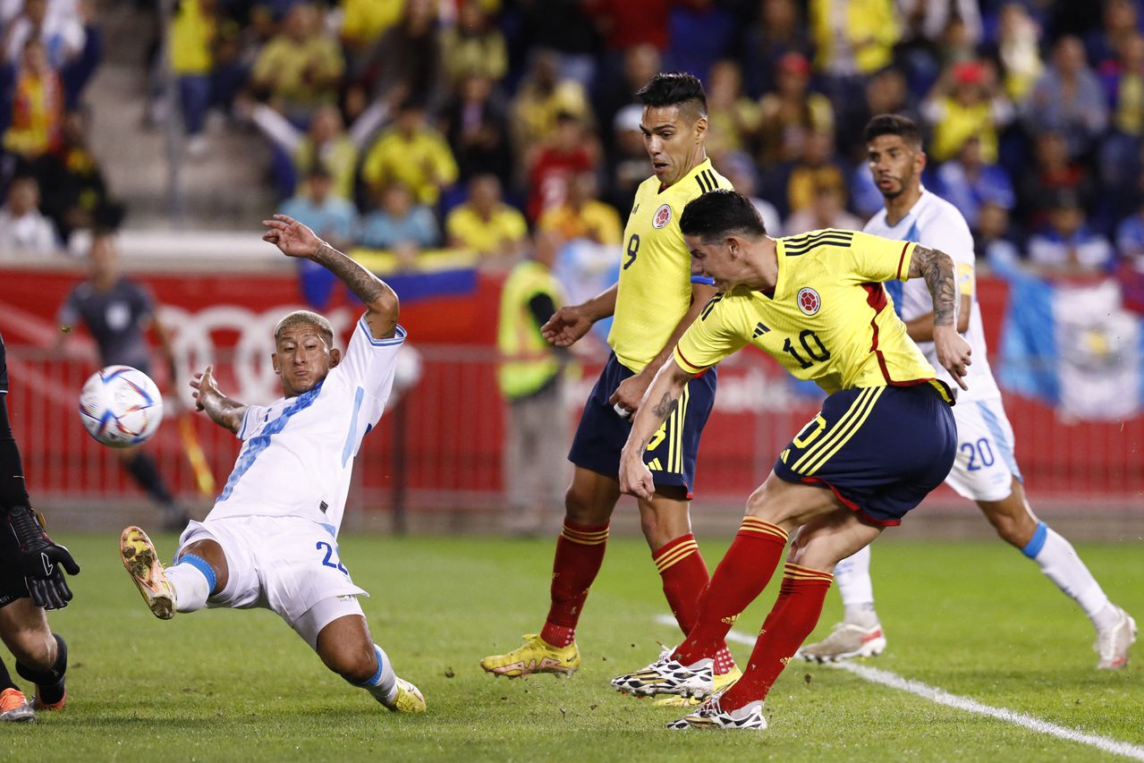 Colombia�s James Rodriguez (R) scores his goal during the international friendly football match between Colombia and Guatemala at Red Bull Arena in Harrison, New Jersey, on September 24, 2022. (Photo by Andres Kudacki / AFP)