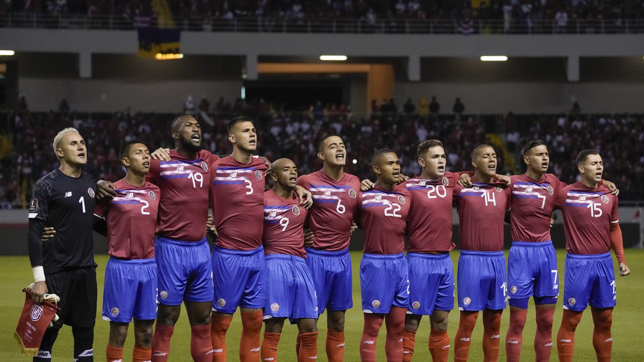 FILE - Costa Rica's players sing the national anthem prior to a qualifying soccer match against the United States for the FIFA World Cup Qatar 2022 in San Jose, Costa Rica, Wednesday, March 30, 2022. The Central American team will play New Zealand on June 14, 2022, for a last chance to make it to the World Cup. (AP Photo/Moises Castillo, File)