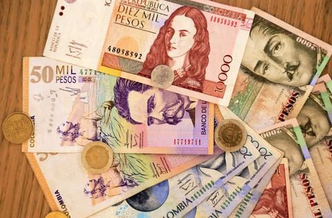 Colombian Peso bills and coins. Bogota.Colombia 05/2017