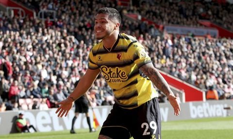 Watford's Cucho Hernandez celebrates scoring during the English Premier League soccer match between Southampton and Watford at St Mary's Stadium, Southampton, England, Sunday March 13, 2022. (AP/Kieran Cleeves/PA)