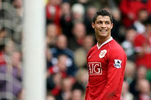 FILE - In this March 17, 2007, file photo, Manchester United's Cristiano Ronaldo smiles during his team's 4-1 win over Bolton Wanderers in their English Premier League soccer match at Old Trafford Stadium, Manchester, England. Ronaldo is headed back to Manchester United. The English club said Friday, Aug. 27, 2021, it has reached an agreement with Juventus for the transfer of the 36-year-old Portugal forward, subject to agreement of personal terms, visa and a medical examination. (AP Photo/Jon Super, File)