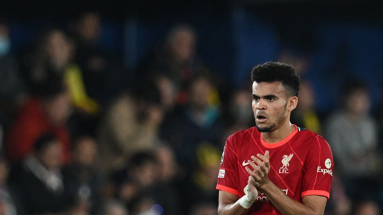Liverpool's Colombian midfielder Luis Diaz celebrates scoring his team's second goal during the UEFA Champions League semi final second leg football match between Liverpool and Villarreal CF at La Ceramica stadium in Vila-real on May 3, 2022. (Photo by Paul ELLIS / AFP)