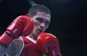 Colombia's Ceiber David Avila Segura celebrates after winning the match against Zambia's Everisto Mulenga exchange during the men's featherweight 57-kg preliminaries boxing match at the 2020 Summer Olympics, Wednesday, July 28, 2021, in Tokyo, Japan. (AP Photo/Frank Franklin II, Pool)