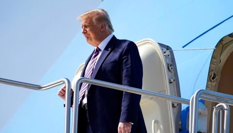 President Donald Trump arrives at Phoenix Sky Harbor International Airport in Phoenix, Monday, Sept. 14, 2020, to attend a Latinos for Trump Coalition Roundtable. (AP Photo/Andrew Harnik