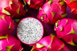 White Dragon Fruit on an old wooden table.