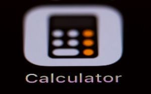17 September 2019, Hessen, Rüsselsheim: Illustration - The Apple calculator icon can be seen on a smartphone display. Photo: Silas Stein/dpa (Photo by Silas Stein/picture alliance via Getty Images)