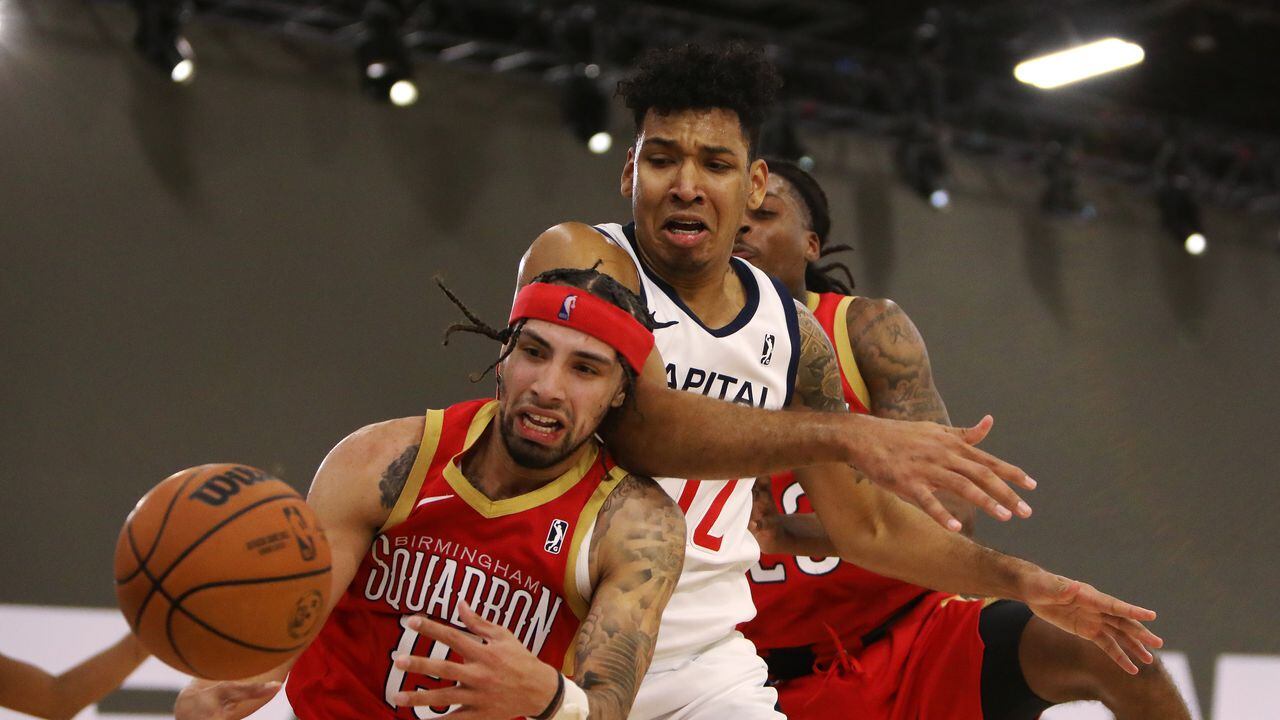 LAS VEGAS, NEVADA - DECEMBER 19: Jose Alvarado #15 of the Birmingham Squadron and Jaime Echenique #12 of the Capital City Go-Go battle for the loose ball during the NBA G League Winter Showcase at the Mandalay Bay Convention Center on December 19, 2021 in Las Vegas, Nevada. NOTE TO USER: User expressly acknowledges and agrees that, by downloading and/or using this photograph, User is consenting to the terms and conditions of the Getty Images License Agreement. (Photo by Joe Buglewicz/Getty Images)