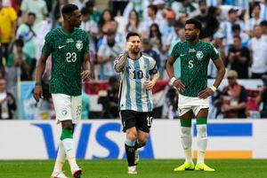 Argentina's Lionel Messi, center, celebrates after he scored the opening goal from the penalty spot during the World Cup group C soccer match between Argentina and Saudi Arabia at the Lusail Stadium in Lusail, Qatar, Tuesday, Nov. 22, 2022. (AP Photo/Natacha Pisarenko)