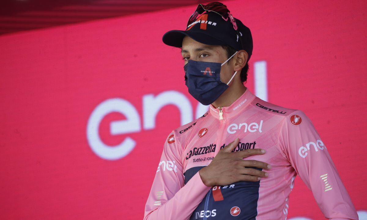 FILE - Colombia's Egan Bernal celebrates on podium after completing the final stage to win the Giro d'Italia cycling race, in Milan, Italy, Sunday, May 30, 2021. Ineos Grenadiers will be looking to make it a hat trick of victories at the Giro d’Italia, with Richard Carapaz favorite for the Italian grand tour which starts on Friday, May 6, 2022 with the first of three stages in Hungary and ends on May 29 in Verona. (AP/Luca Bruno, File)