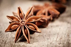Star anise exotic spice on a old wooden table