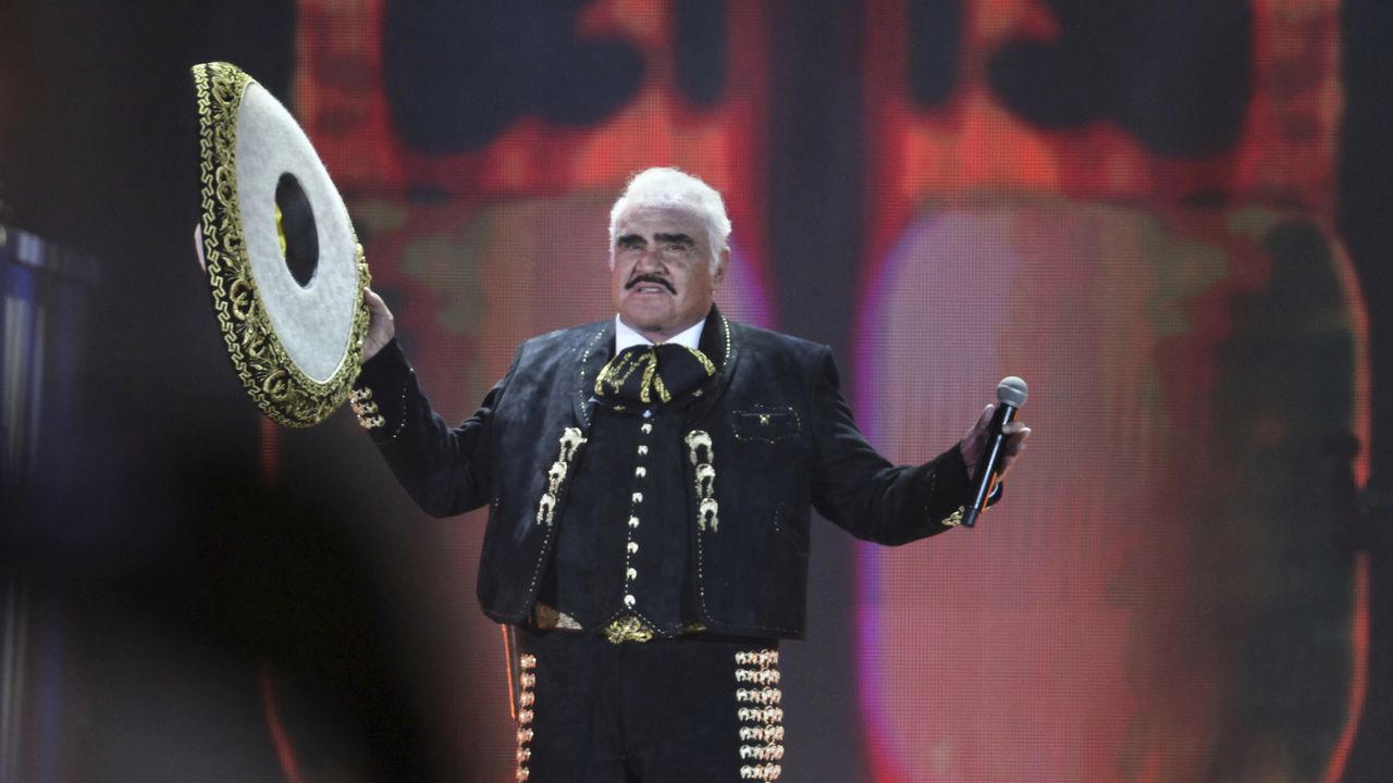 FILE- In this file photo of Saturday, April 16, 2016, the Mexican singer Vicente Fernandez performs at a free concert at Azteca Stadium. Fernández, the regional Mexican music star whose powerful voice immortalized songs like "El rey", "Volver, Volver" and "Pity that you are alien" while inspiring new generations of performers like his son Alejandro Fernández Jr., He died early Sunday, Dec. 12, 2021, relatives reported. He was 81 years old. (AP Photo/Marco Ugarte)