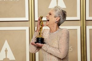 Best Supporting Actress Jamie Lee Curtis poses with her Oscar in the Oscars photo room at the 95th Academy Awards in Hollywood, Los Angeles, California, U.S., March 12, 2023. REUTERS/Mike Blake