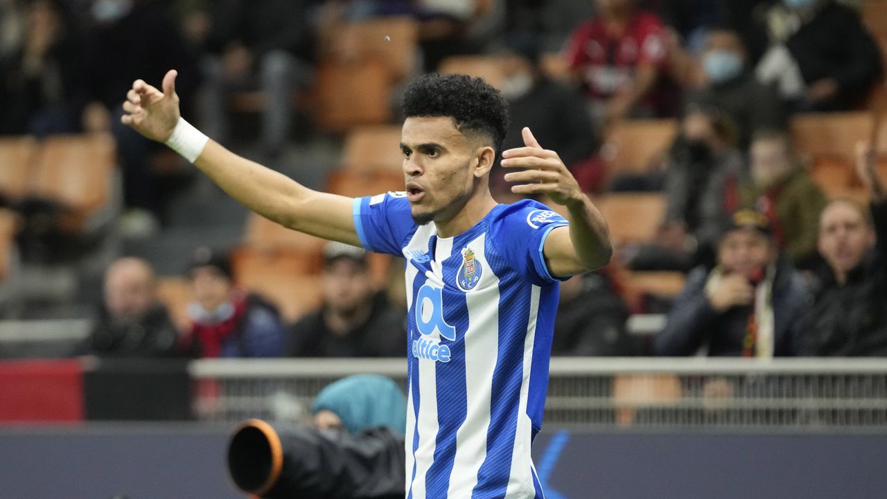 Porto's Luis Diaz celebrates after scoring his side's opening goal during the Champions League group B soccer match between AC Milan and Porto at the San Siro stadium in Milan, Italy, Wednesday, Nov. 3, 2021. (AP Photo/Luca Bruno)