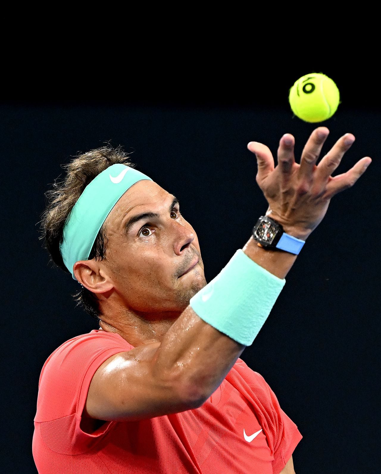 BRISBANE, AUSTRALIA - JANUARY 02: Rafael Nadal of Spain serves in his match against Dominic Thiem of Austria during day two of the  2024 Brisbane International at Queensland Tennis Centre on January 02, 2024 in Brisbane, Australia.  (Photo by Bradley Kanaris/Getty Images)