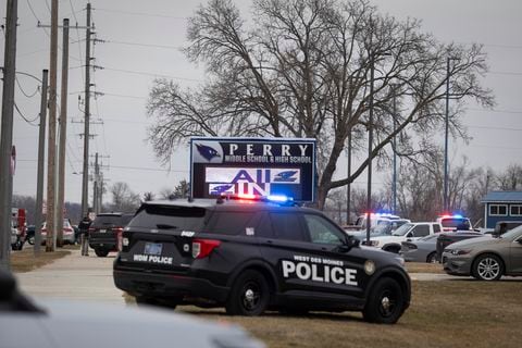Law enforcement officials patrol the Perry Middle School and High School complex during a shooting on January 4, 2024, in Perry, Iowa. A shooting on Thursday at the high school in Perry left "multiple gunshot victims," local authorities said, adding the incident was over but without confirming if anyone had been killed. (Photo by Christian Monterrosa / AFP)