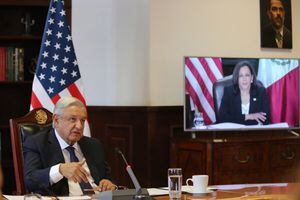 Handout photo released by the Mexican Presidency showing President Andres Manuel Lopez Obrador (L) during his virtual meeting with US Vice President Kamala Harris at the Palacio Nacional in Mexico City on May 07, 2021. (Photo by - / Mexican Presidency / AFP) / RESTRICTED TO EDITORIAL USE - MANDATORY CREDIT "AFP PHOTO / MEXICAN PRESIDENCY " - NO MARKETING - NO ADVERTISING CAMPAIGNS - DISTRIBUTED AS A SERVICE TO CLIENTS