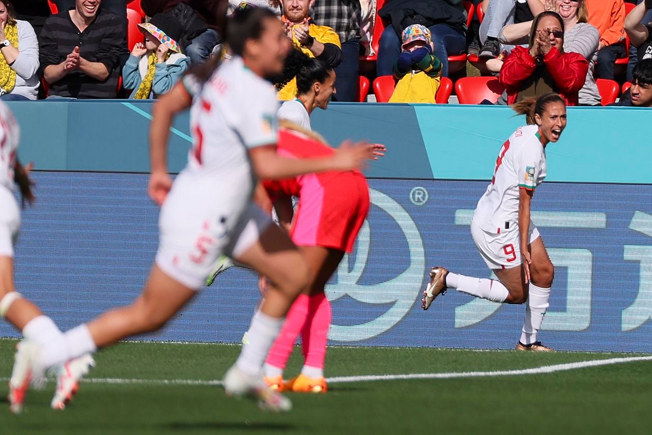 Morocco's Ibtissam Jraidi, right, celebrates after scoring her team's first goal during the Women's World Cup Group H soccer match between South Korea and Morocco in Adelaide, Australia, Sunday, July 30, 2023. (AP Photo/James Elsby)