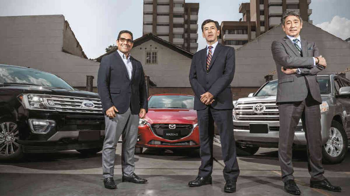De izquierda a derecha: José Armando García, director general de Ford Motor Colombia; Carlos Mesa, director de servicio al cliente de Mazda, y Edge Egashira, presidente de Automotores Toyota Colombia.