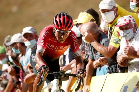 Colombia's Nairo Quintana crosses the finish line of the stage 13 of the Tour de France cycling race over 191 kilometers from Chatel-Guyon to Puy Mary, Friday, Sept. 11, 2020. (Benoit Tessier, Pool via AP)