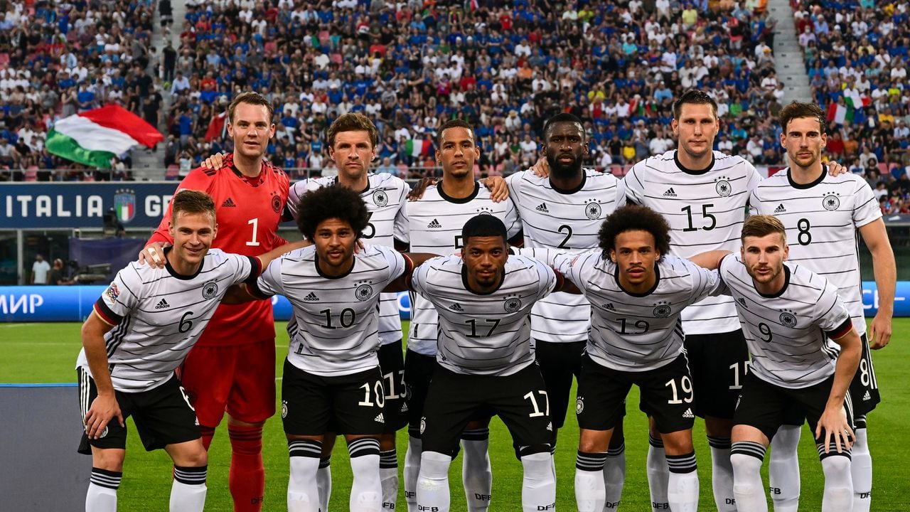 (From L, Rear) Germany's goalkeeper Manuel Neuer, Germany's forward Thomas Mueller, Germany's defender Thilo Kehrer, Germany's defender Antonio Ruediger, Germany's defender Niklas Suele and Germany's midfielder Leon Goretzka and (From L, Front) Germany's midfielder Joshua Kimmich, Germany's forward Serge Gnabry, Germany's defender Benjamin Henrichs, Germany's midfielder Leroy Sane and Germany's forward Timo Werner pose for a team photo prior to the UEFA Nations League - League A, Group 3 first leg football match between Italy and Germany on June 4, 2022 at the Renato Dall'Ara stadium in Bologna. (Photo by Miguel MEDINA / AFP)