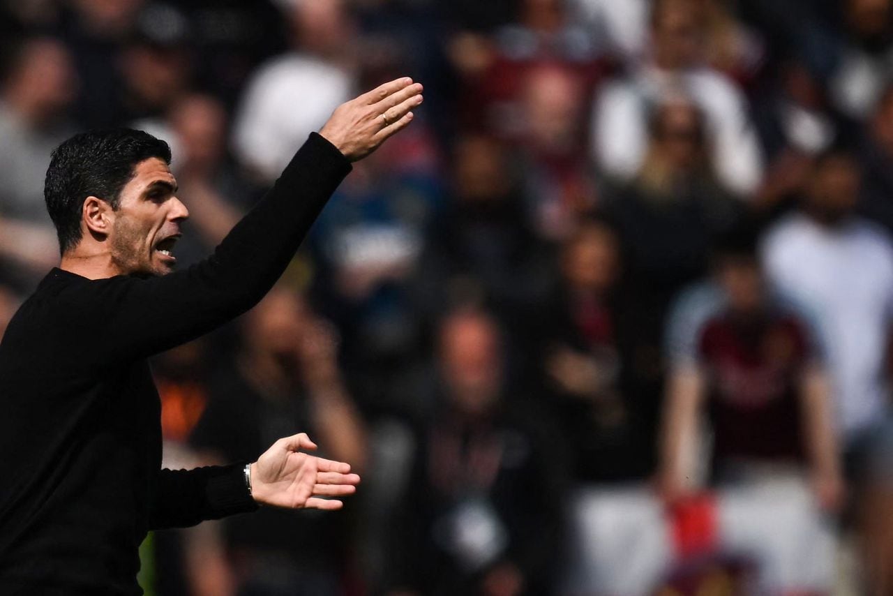 Arsenal's Spanish manager Mikel Arteta reacts during the English Premier League football match between West Ham United and Arsenal at the London Stadium, in London on April 16, 2023. (Photo by Ben Stansall / AFP) / RESTRICTED TO EDITORIAL USE. No use with unauthorized audio, video, data, fixture lists, club/league logos or 'live' services. Online in-match use limited to 120 images. An additional 40 images may be used in extra time. No video emulation. Social media in-match use limited to 120 images. An additional 40 images may be used in extra time. No use in betting publications, games or single club/league/player publications. /